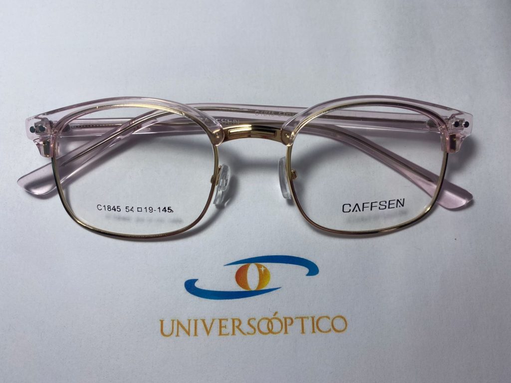 Armazón UP123, de forma cuadrada con esquinas redondeadas y contorno dorado.